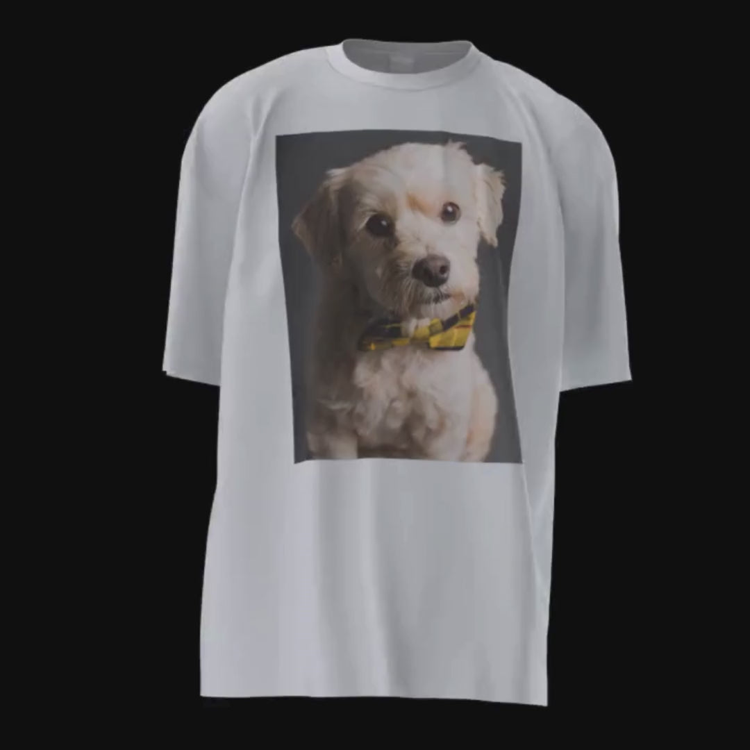 elegant doggy 3D walking t-shirt video. The front; a snap of an elegant, beige white, little dog. The back; a yellow rectangle, with a funny pun and onomatopoeia note in light grey; yellow tartan bow tie cute doggy, barking elegance, bow wow wow, stand out now! SnapNote streetwear logo